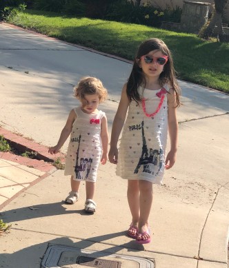 An Adorable Duo in Matching Dresses