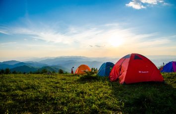 photo-of-pitched-dome-tents-overlooking-mountain-ranges-1687845